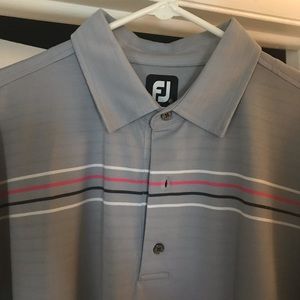 Footjoy Men’s Golf Shirt.  2XL Grey with four stripes across the chest and back.